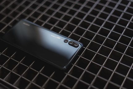 Three cameras and artificial intelligence promise to deliver better pictures than ever before