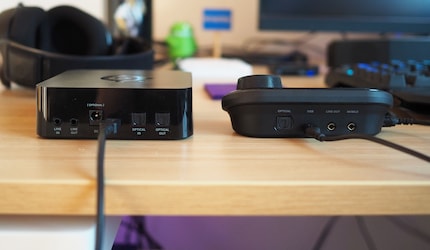 On the left, the wireless headset's base station, on the right the GameDAC's remote control.