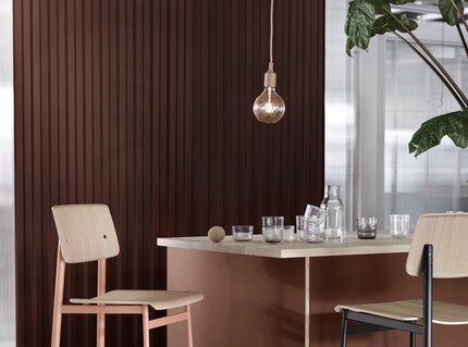 La création de zones est facile : les lampes comme celle-ci sont une solution simple pour délimiter des zones. Image : Muuto