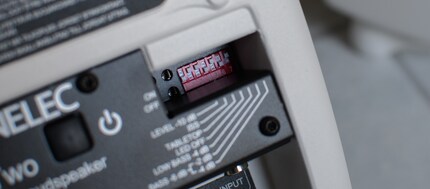 The small switches on the back can be adjusted with a pen.