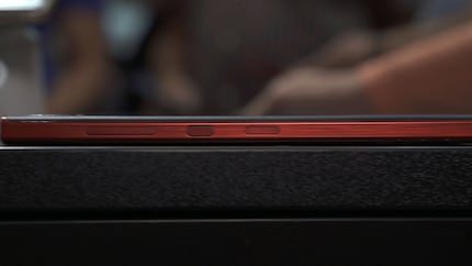 The red is just one highlight. Black still dominates the phone