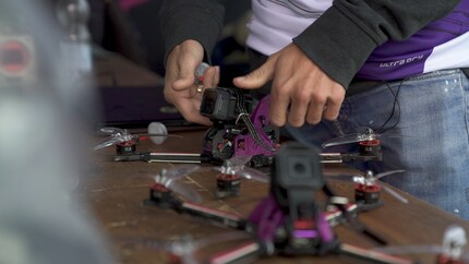 Racing drone including GoPro.