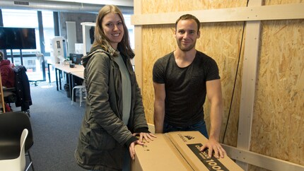 Two Cheshire cat grins: Kevin from the editing team celebrates with Calypso.