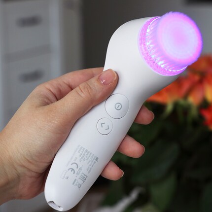 Le bouton de fonction se trouve juste en dessous du bouton marche/arrêt. 