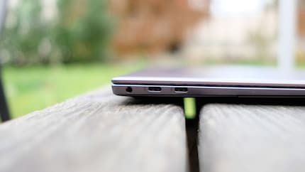 You can use both USB C ports for charging.