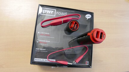 The road set includes a 600 lumen lamp head, a 3350 mAh battery, a holder and charging cable.