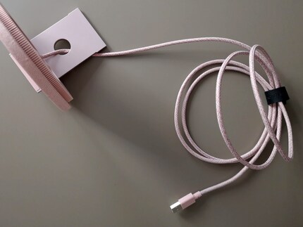 The opening in the magnetic induction plate is for the cable to pass through.