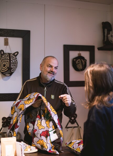 Felix shows me some fabric in its initial state.