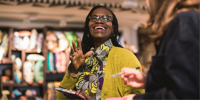 Bola's own look is a testament to how these colourful prints are worn. She shares her styling tricks with visitors to the store. Bola's own look is a testament to how these colourful prints are worn. She shares her styling tricks with visitors to the store.