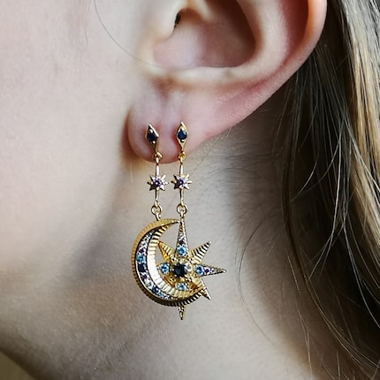 Se, come la mia collega Nati, hai due fori, puoi indossare i due orecchini sul lobo di un orecchio.