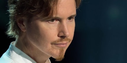Critique féroce: Grant Achatz des États-Unis est l'un des chefs étoilés que doivent affronter les candidats (source:Netflix).