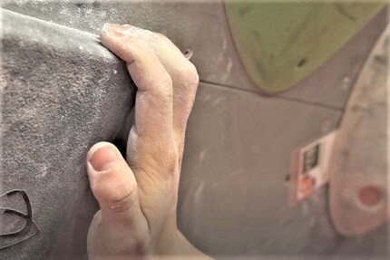 Linear handhold with suspended grip