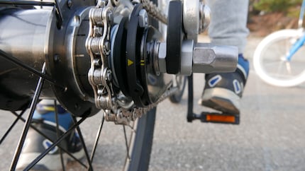 If the tip of the yellow triangle in second gear points between the two lines, the gears are set correctly. It is very easy to readjust using a screw on the shift cable.