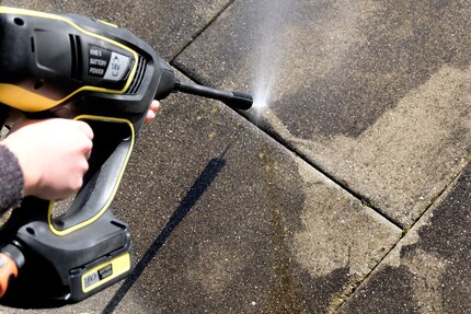 If you get really close, the pressure is enough for patio slabs. Your back won't thank you though.