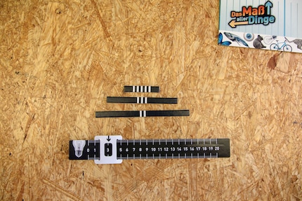 Three estimation strips and the scoring tape.