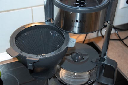 The filter module opens to the side and snaps back into place when closed.