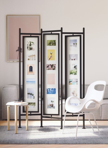 Un paravent deux en un : à la fois brise-vue et cadres photo. Photo : Umbra