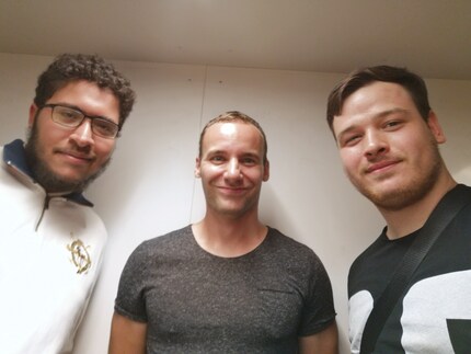 Viktor, a visibly embarrassed editor and David