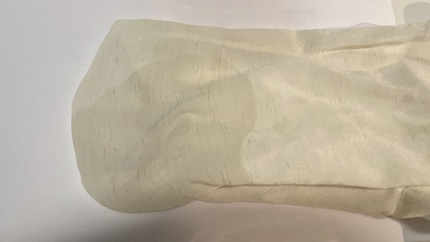 The fabric should really soak up the hairspray.