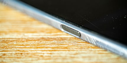 The fingerprint sensor on the side isn't reliable and should be removed completely.