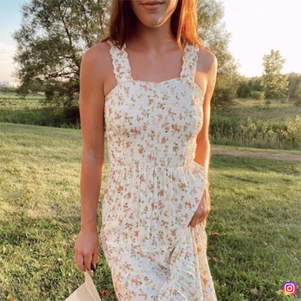 With a floral dress smocked at the waist, this blogger emphasises her chocolate side. Image: @sharpley.styled