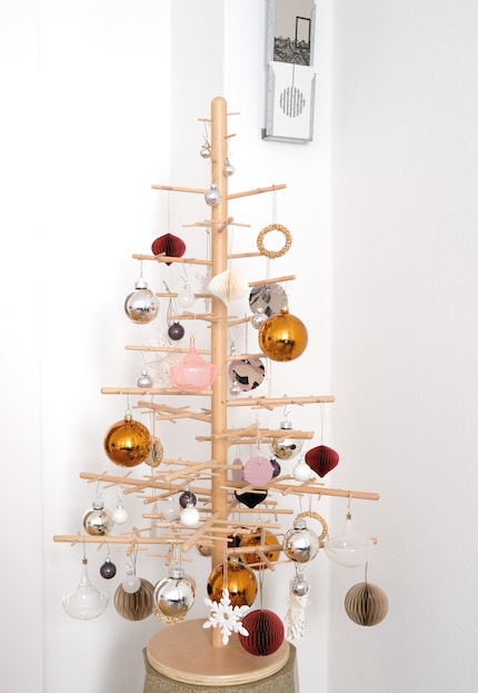 First: The wooden tree is only half as beautiful without greenery.