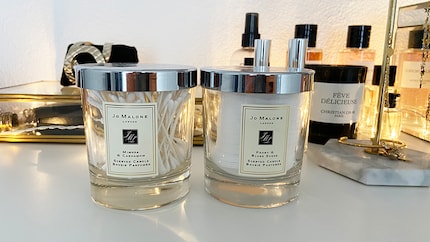 I repurpose pretty candle jars I. I use these empty candle jars to store cotton pads and Q-tips.