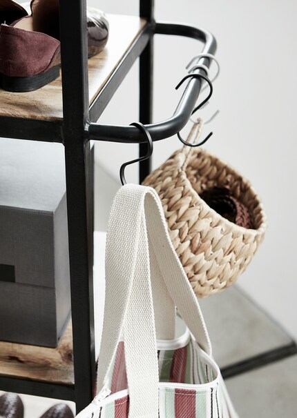 Funzionale al massimo: le ceste appese creano ulteriore spazio. Immagine: House Doctor