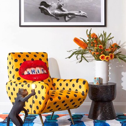 «Shit» blends in naturally thanks to the black and white photography and black accessories. Image: Seletti