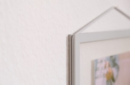 L'élastique qui relie tous les éléments du cadre.