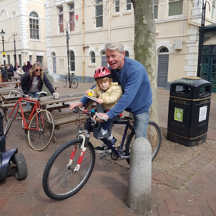 Paul riding through Margate with his daughter Nellie Bee – at least she’s wearing a helmet.
