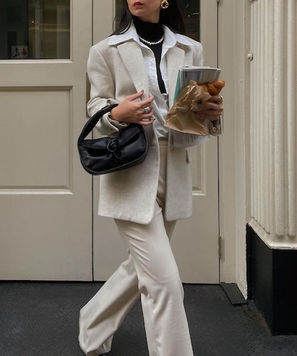 Influencer Caroline Lin makes the collar-over-reverse look classy.