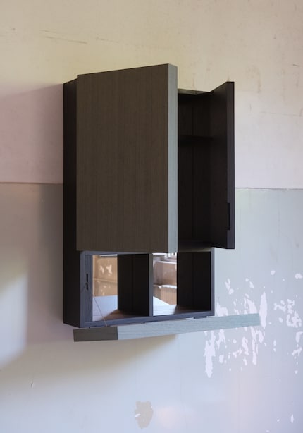 The bar cabinet is part of the «Collage» collection.