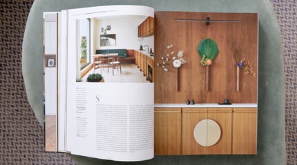 In this apartment, vases are nailed to the wall.