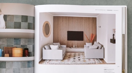 Cleverly camouflaged: the television is framed by a wooden wall.