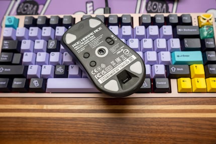 The Asus ROG Harpe Ace Aim Lab Edition glides across the table with almost no friction thanks to the five sliders.