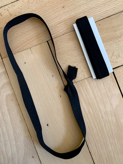 The solution? A simple elastic band.