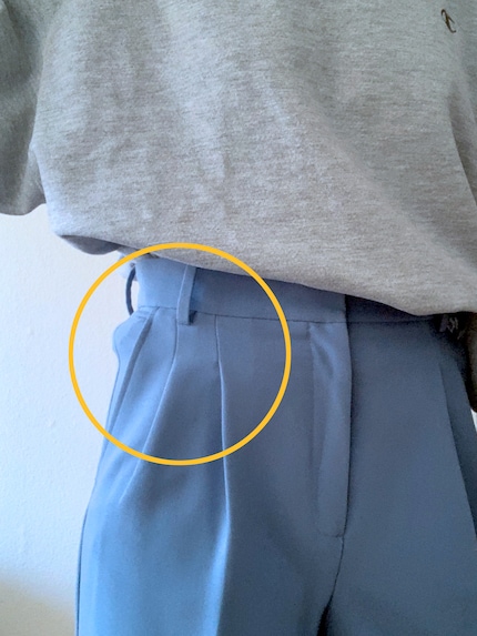 Stuffing your jumper into the waistband of your pants or skirt creates strange-looking bulges.