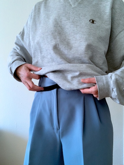 ... and tuck the hem of your sweater under it.