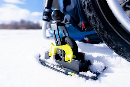Patrick's wheelchair also works in the snow thanks to the wheelblades.