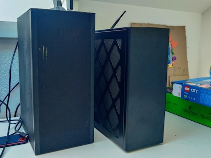 The NUC (right) isn’t really any smaller than my Mini-ITX PC.