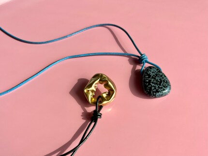 A triple overhand knot makes dangling charms look especially beautiful.