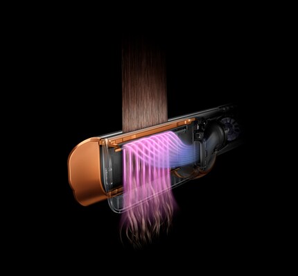 The airflow pulls the hair downwards.