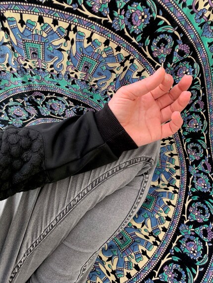 Hand postures during meditation are called mudras and are designed to help maintain concentration and create harmony between tension and relaxation. I used to think it was a little silly, but now I adopt the hand position automatically when I sit down to meditate.