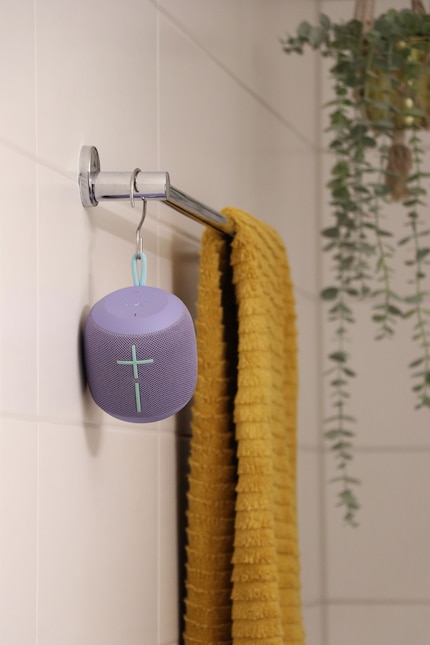 When things get tight around the sink, I like to hang my speakers on a hook.