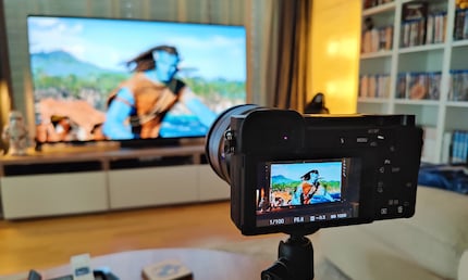 Keep your eyes on the camera display to see how much I need to reduce the image brightness so that the bright light from the TV doesn’t completely drown out the image.