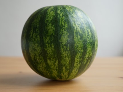 The melon should be a consistent, dark green.
