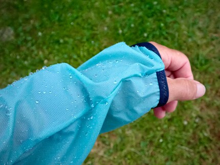 Drops of rain bead up on the jacket, but it’s not a suitable rain jacket because of the mesh back.