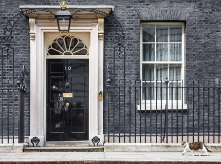 Larry in front of his home with the distinctive door.