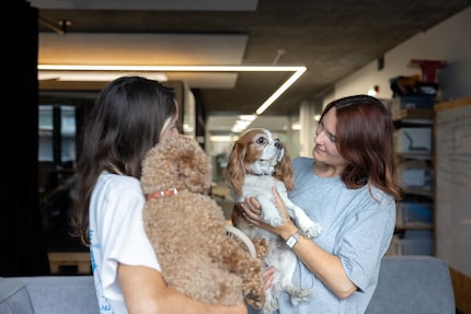 Good friends: Clémence holding Maya (left) and Lizzy holding Polly.